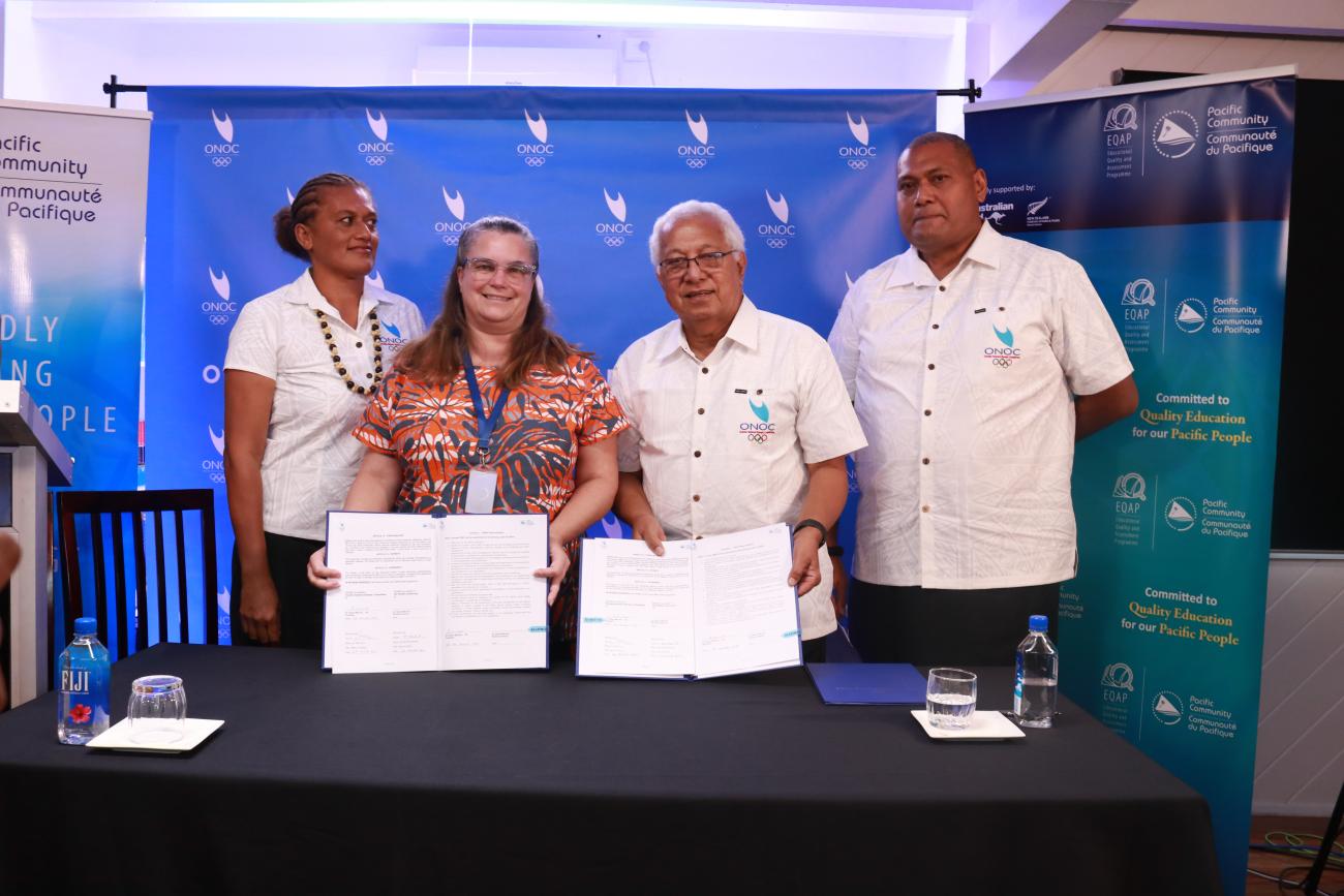 EQAP Director Dr Michelle Belisle, second from left, witnessed for SPC. Dr Belisle is pictured with, from left, OSEP Coordinator Sainimili Saukuru, ONOC President Dr Robin Mitchell, and ONOC Officer-in-Charge Meli Cavu.